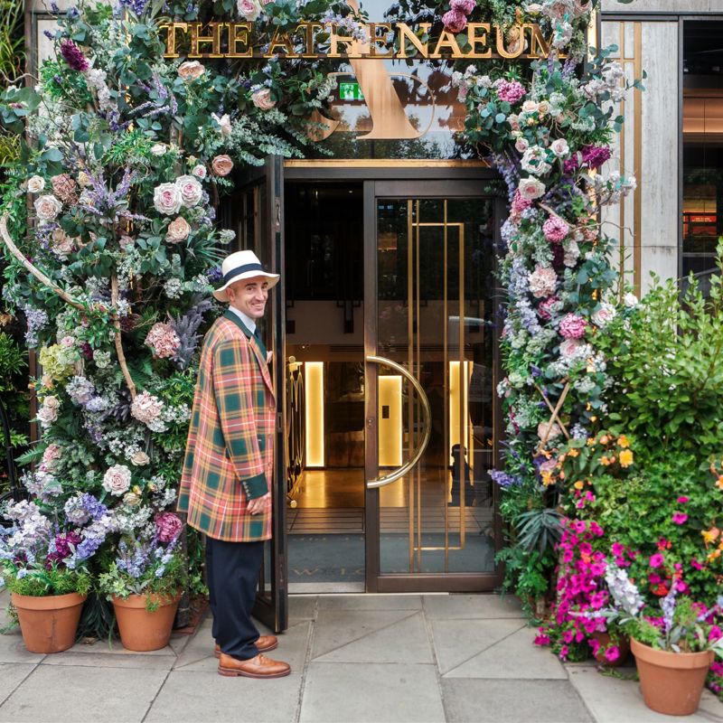 Door man opening door at The Athenaeum Hotel & Residencies