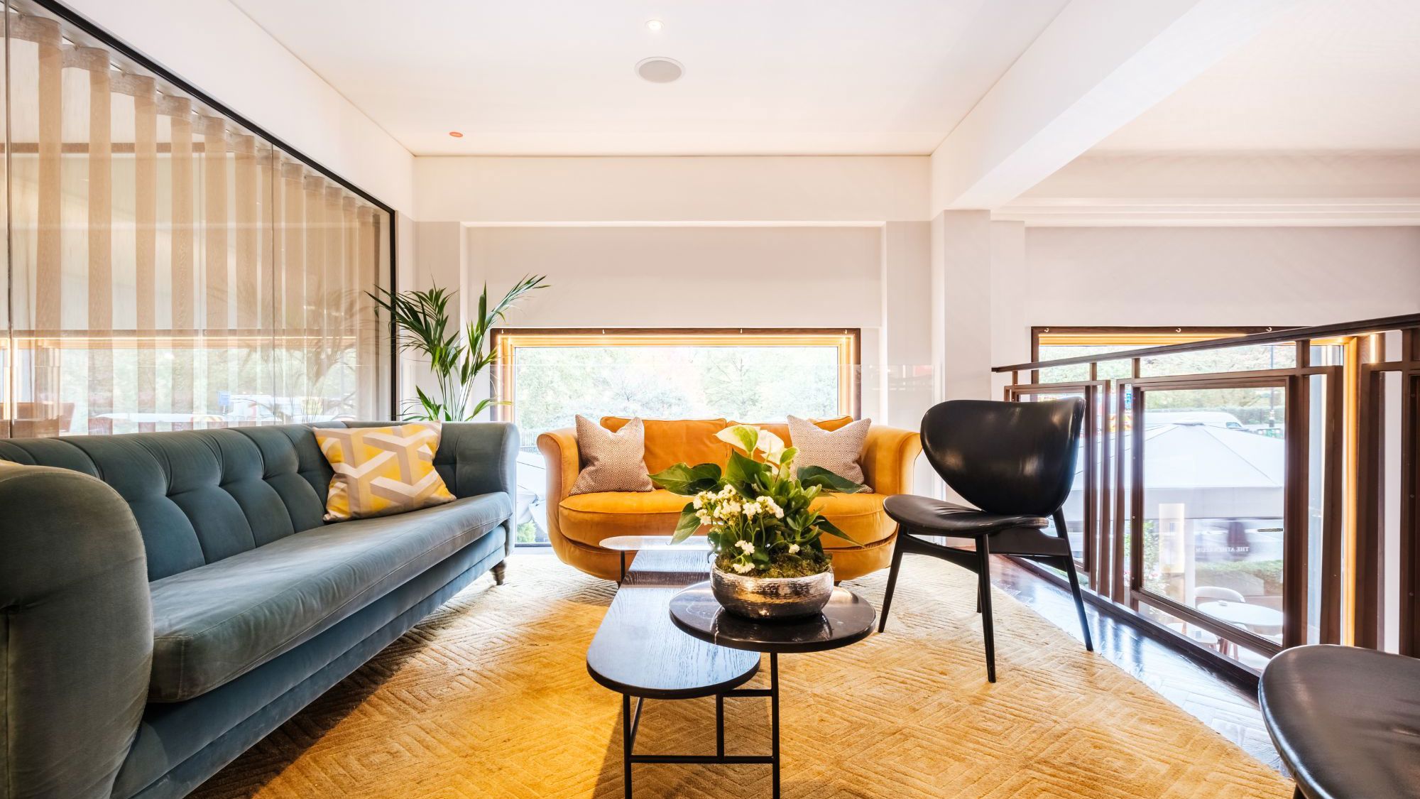 Balcony space with sofa and chairs