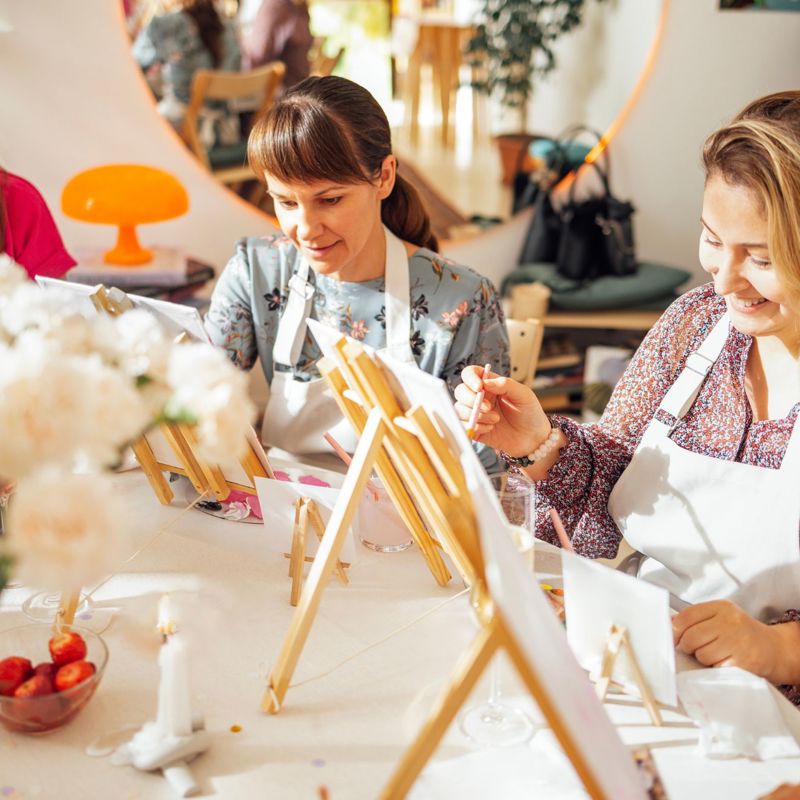 women enjoying an art class