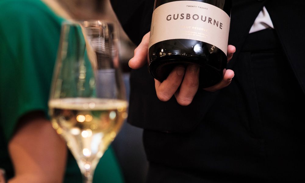 Serving a bottle of Gusbourne's sparkling wine