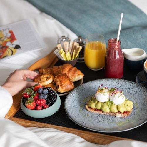 The Athenaeum Hotel & Residences breakfast in bed