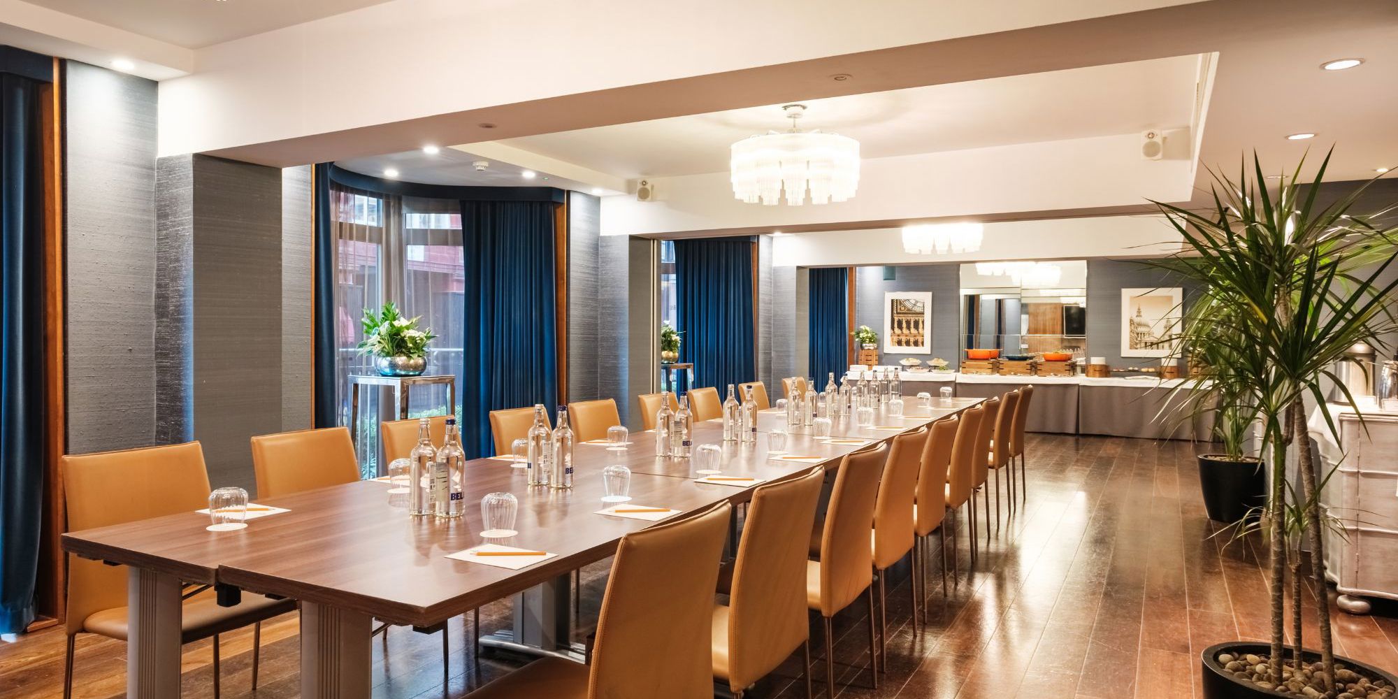 Meeting room with long table and chairs