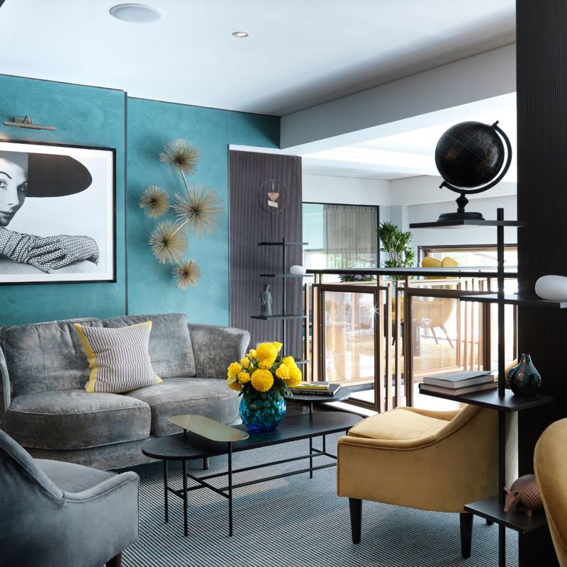 Balcony space with sofa and chairs