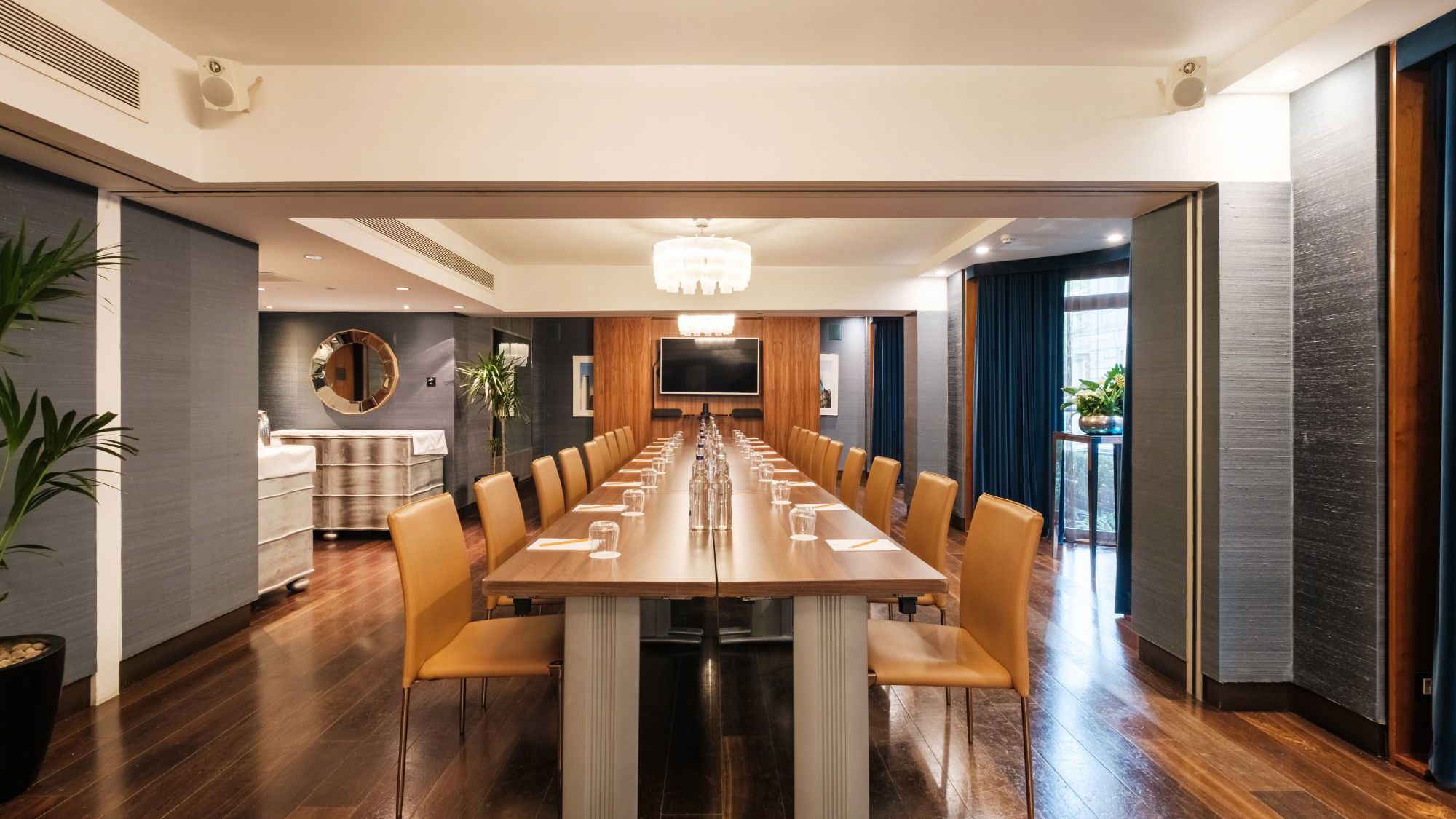 Meeting room with long table and chairs