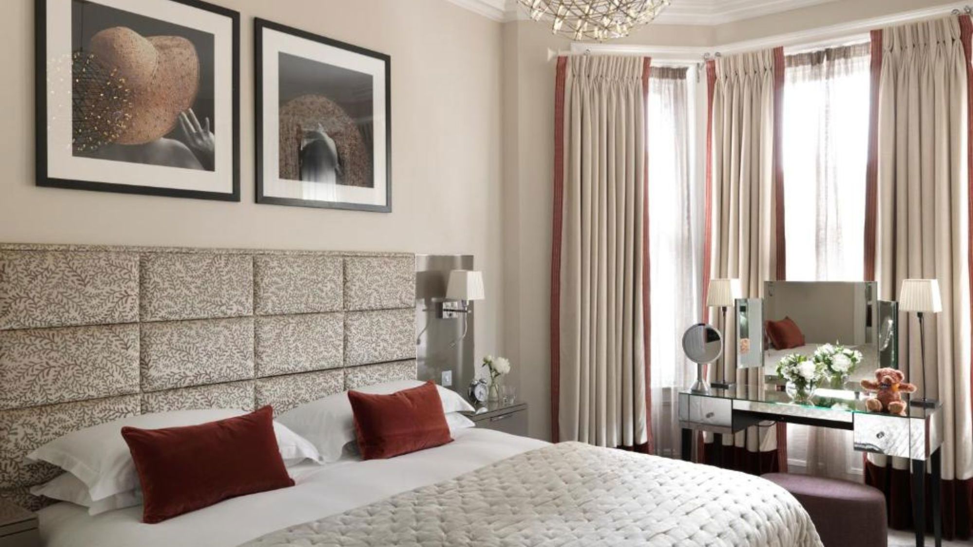 Residency bedroom with bed and desk by window