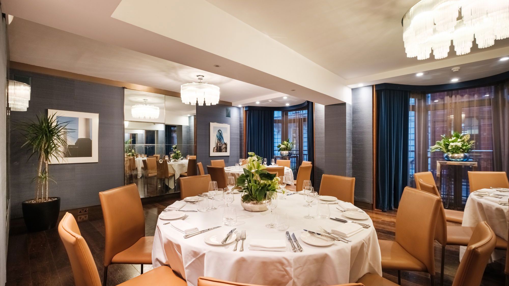 Dining table with tablecloth and place settings