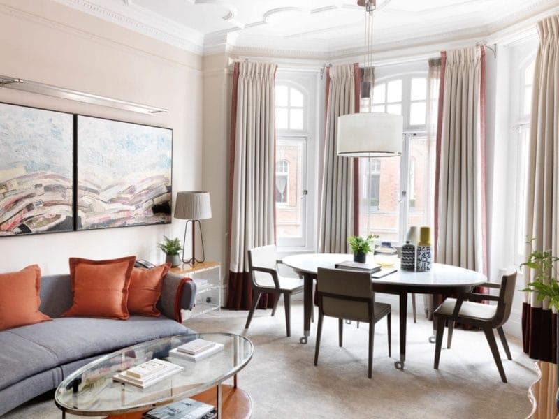 The open plan lounge space of Residences at The Athenaeum. This is a luxury serviced apartment in London.