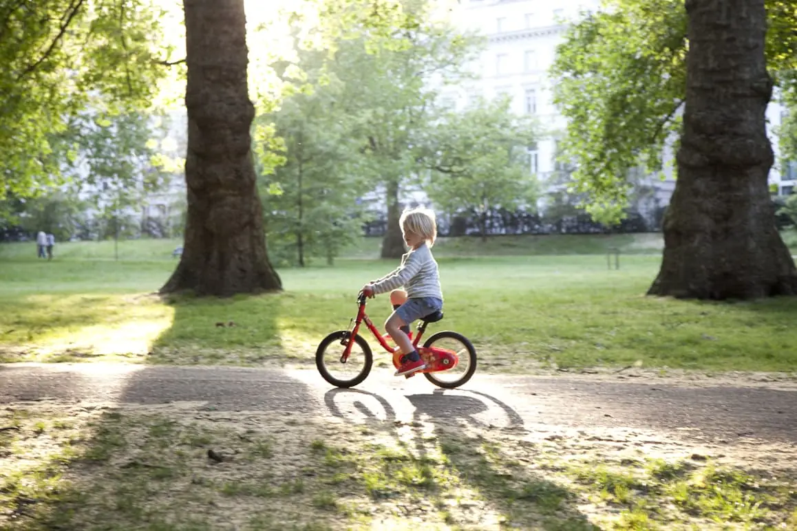 Boy on bike in Green Park