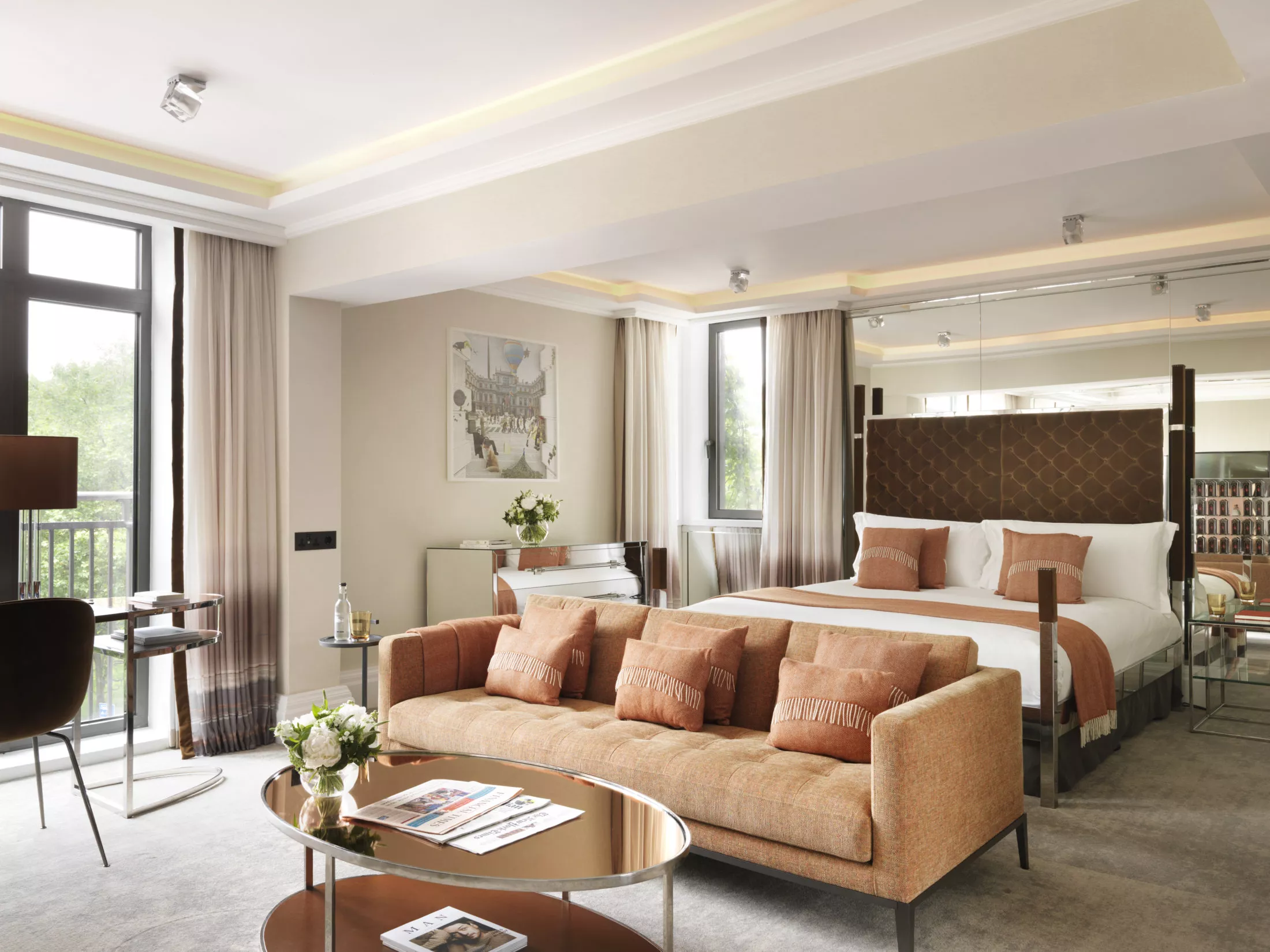 The combined bedroom and living room space of The Athenaeum's family suite in London.